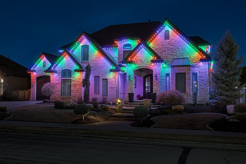 A home that has a full green Trimlight pattern to celebrate Halloween