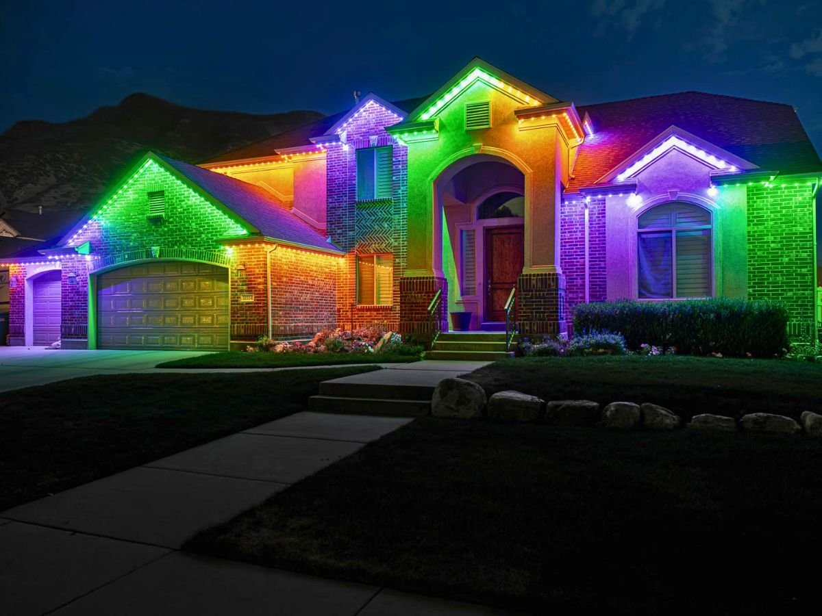 A home with a orange, green, and purple Trimlight pattern