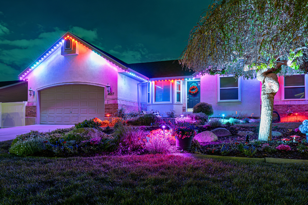 a home with valentine's day themed landscape lighting