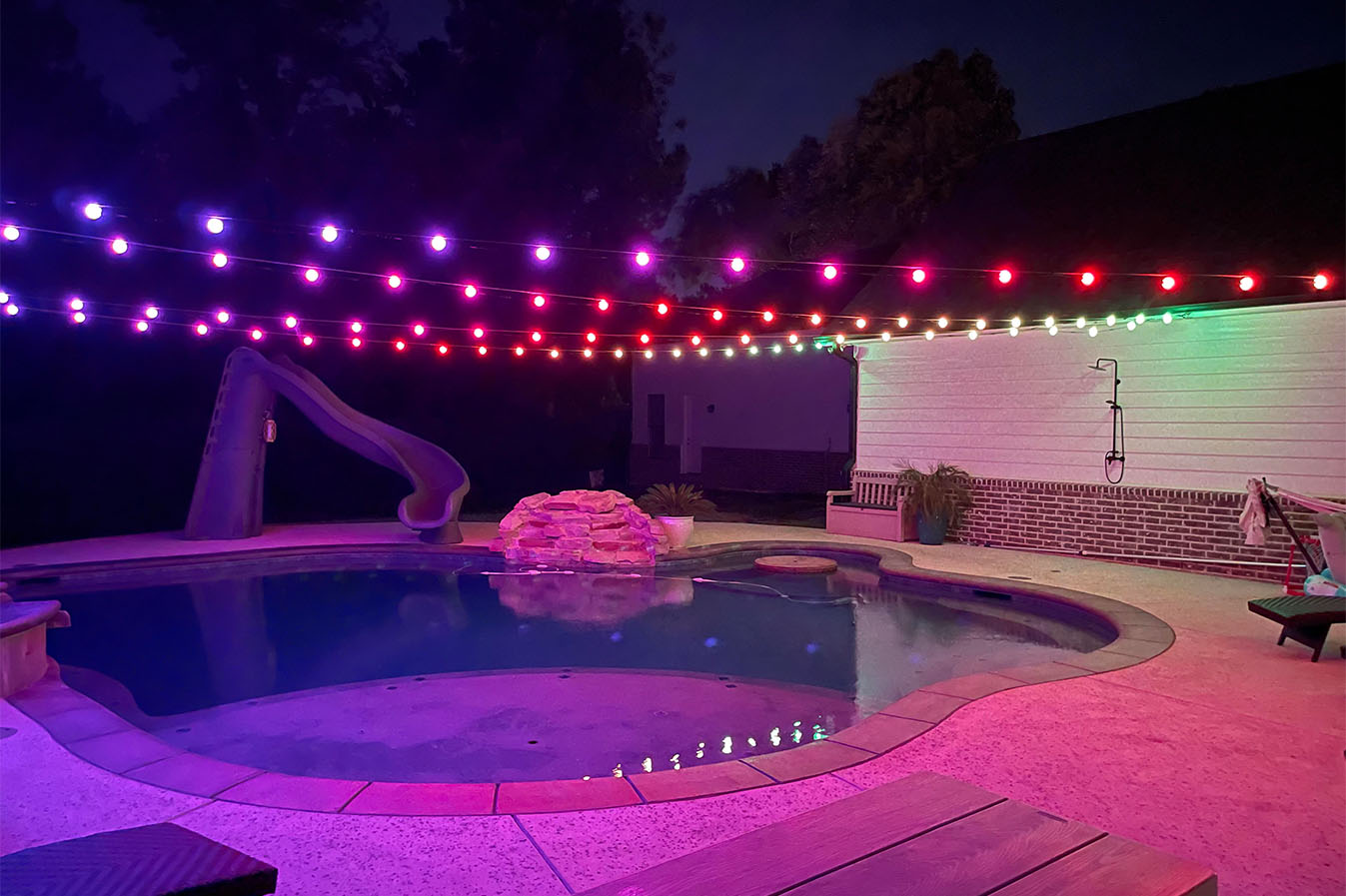 Moody globe lights for a nightside pool