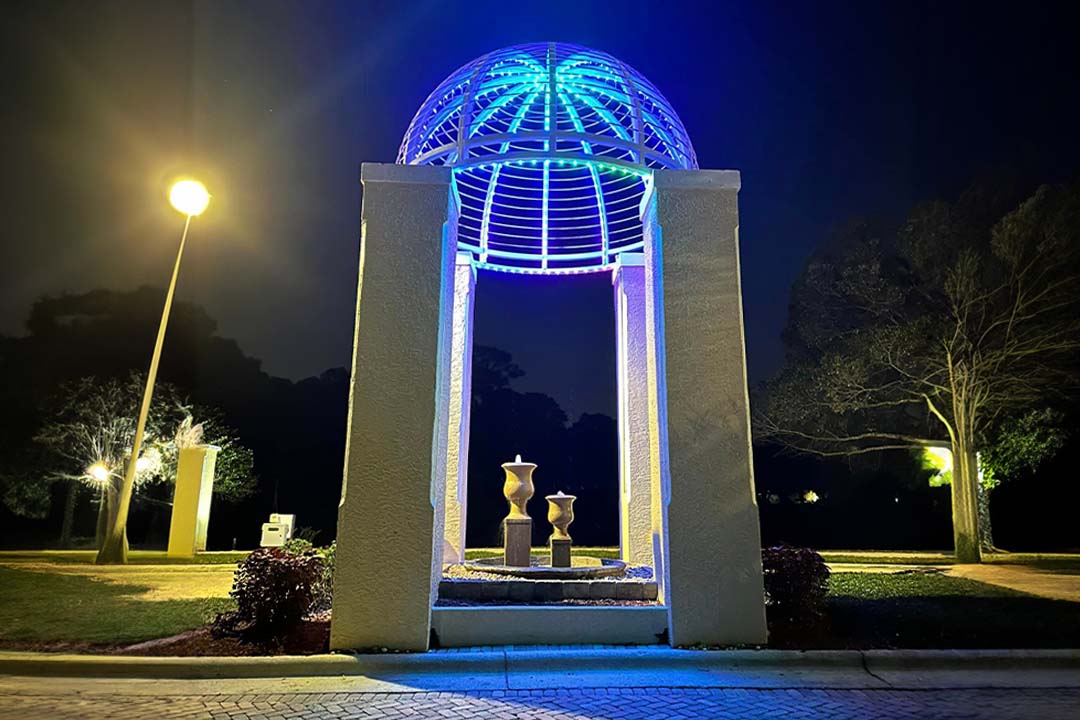 Fountain arch gazebo Trimlight display at park 