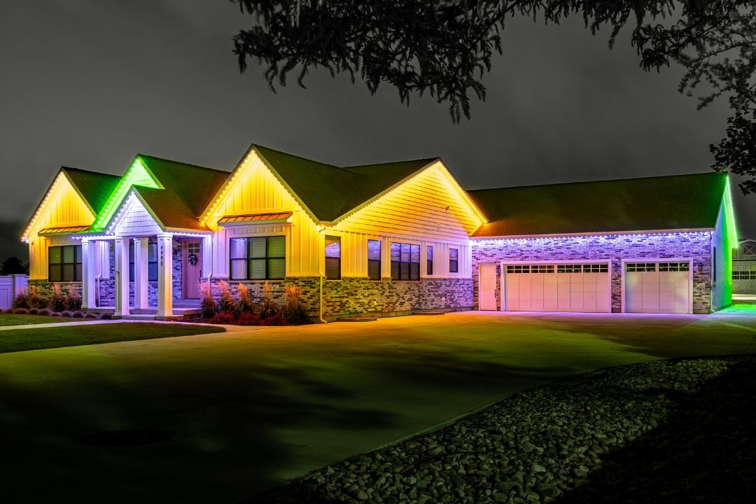 A wider home with orange, pruple and green lighting pattern