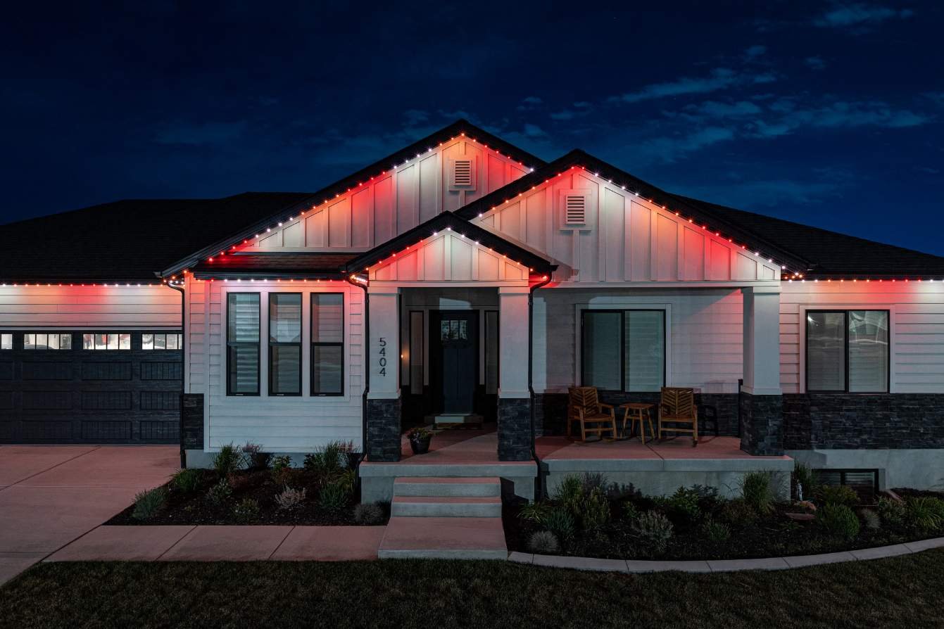 a home with 3 peaks with a red white a blue LED light pattern