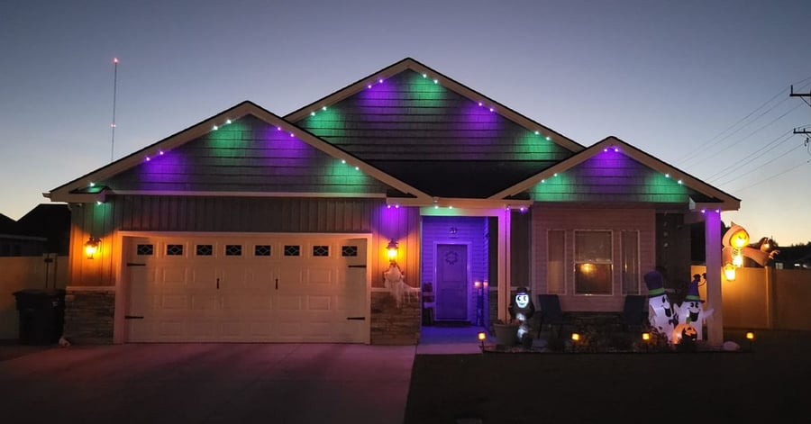 Spooky Halloween home with outdoor permanent app controlled permanent lights