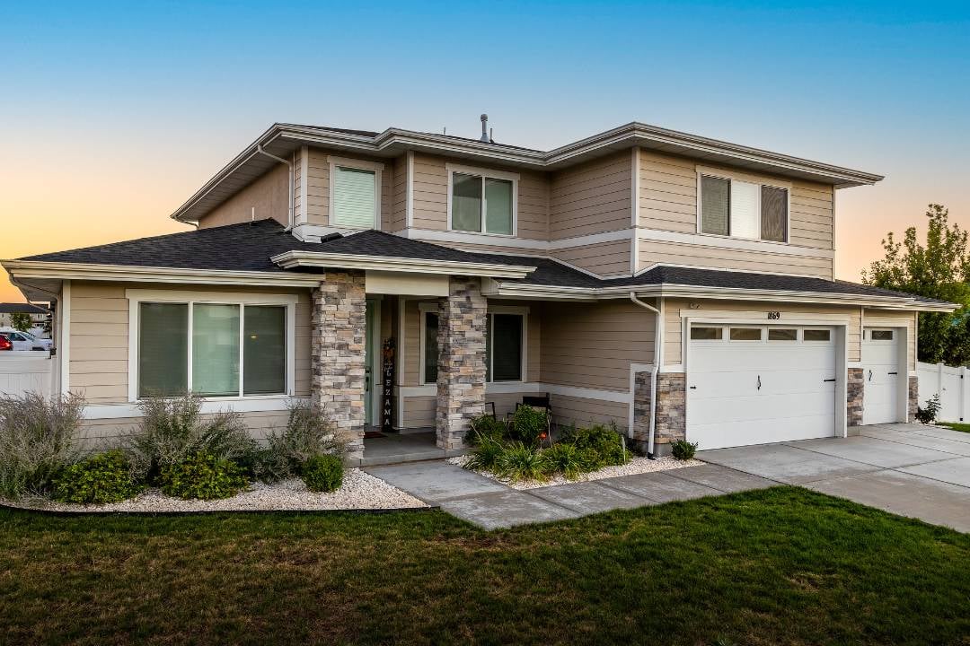 Modern home with brick in front and Trimlights hidden patented channel design.