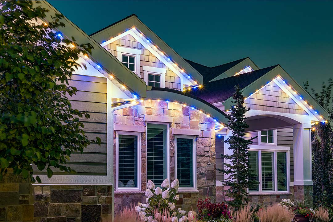 curved Trimlight on the front exterior of a home